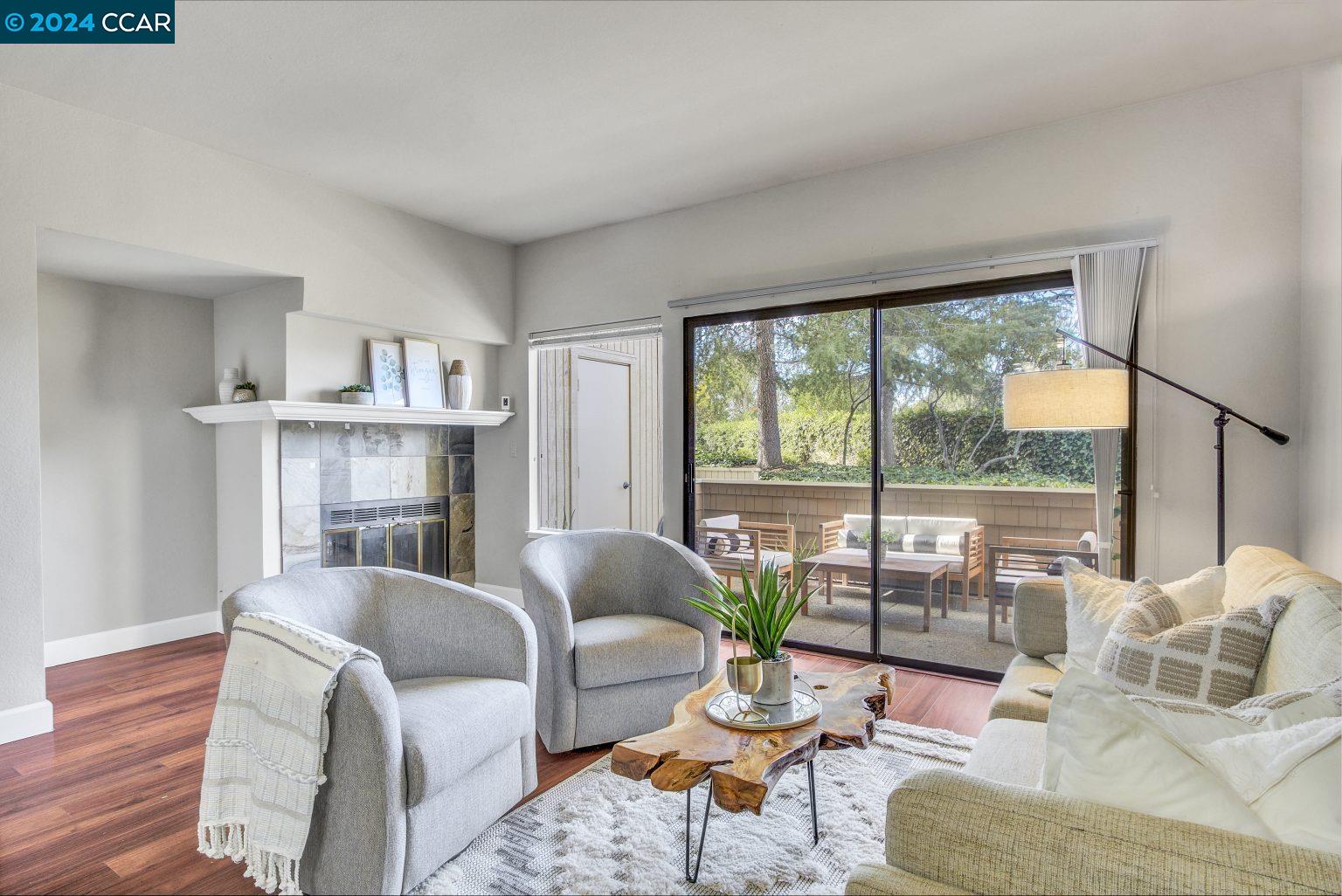 122 Copper Ridge Road San Ramon, CA 94582 - Photo 1 of 1 a living room with furniture and a large window
