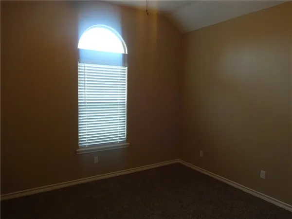 a view of a small space with a window