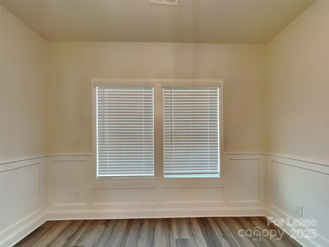 a view of a room that has a window