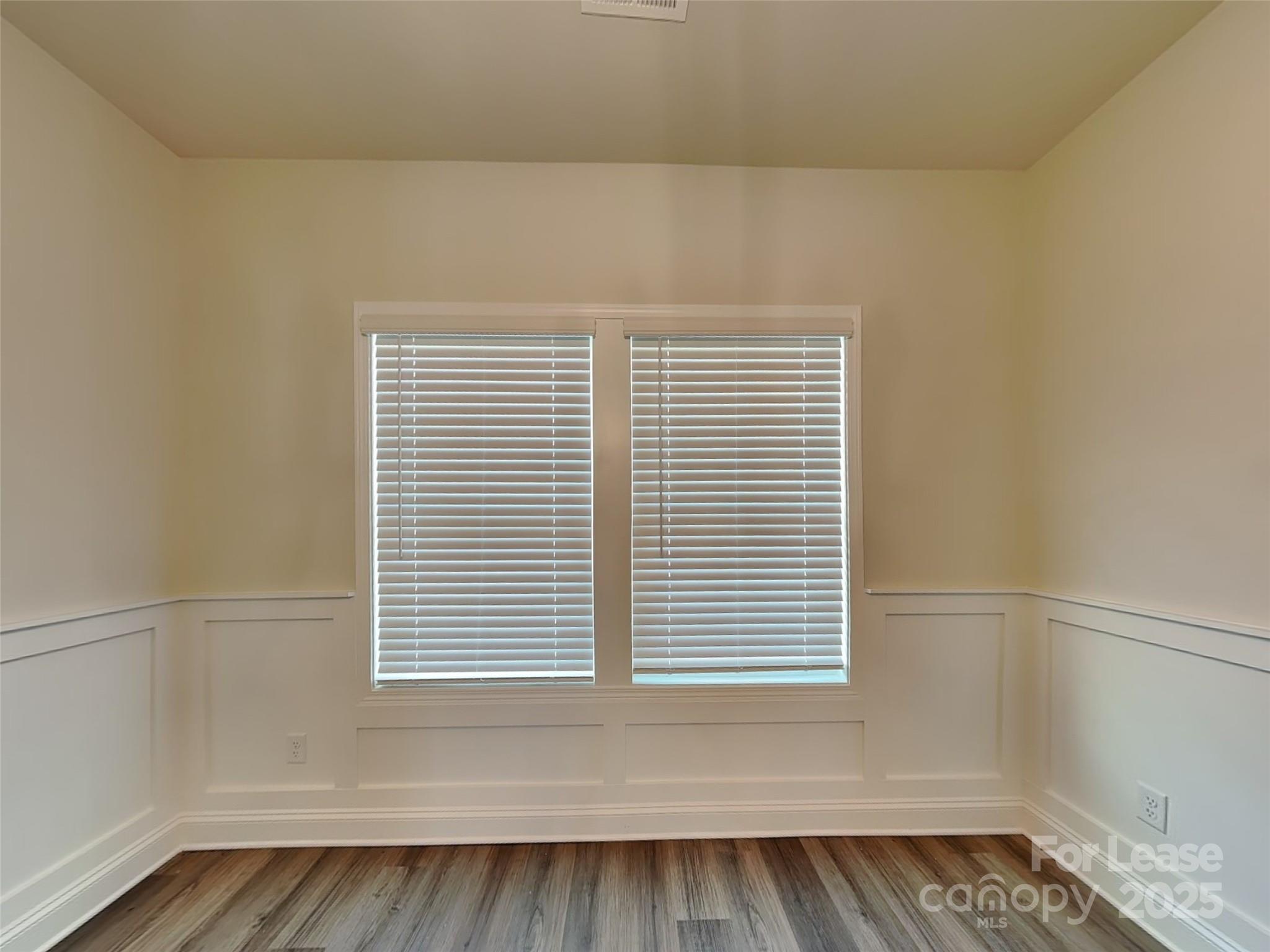 168 Queenshall Road Mooresville, NC 28117 - Photo 7 of 18 a view of a room that has a window