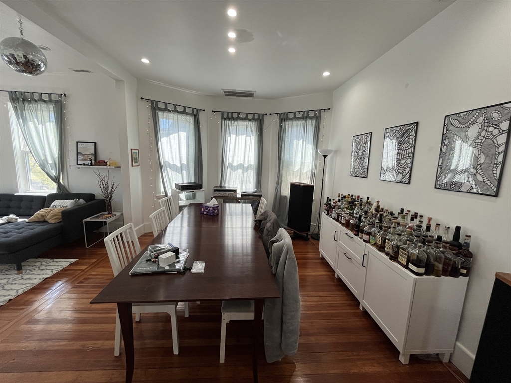 48 Sheffield Road, Unit 2 Boston, MA 02131 - Photo 6 of 18 a view of a dining room with furniture and wooden floor