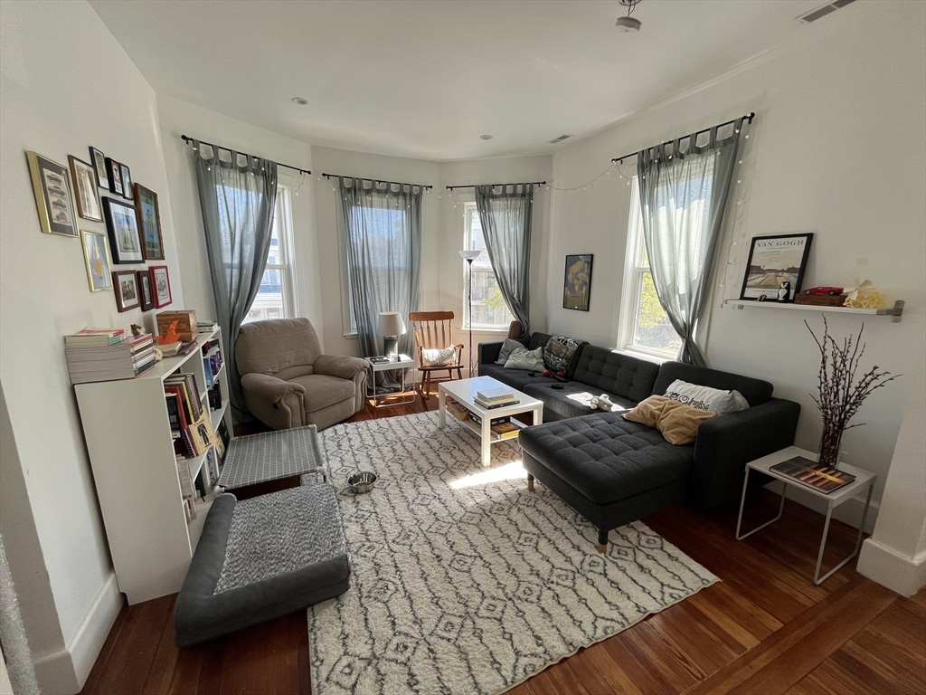 48 Sheffield Road, Unit 2 Boston, MA 02131 - Photo 8 of 18 a living room with furniture and a window