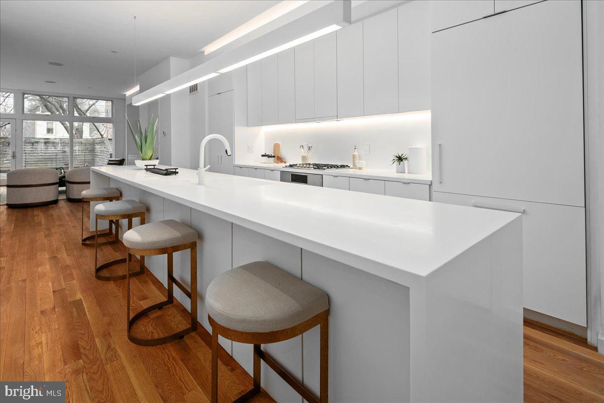 1541 6th Street Northwest, Unit 1 Washington, DC 20001 - Photo 9 of 34 Statement Island with lots of seating