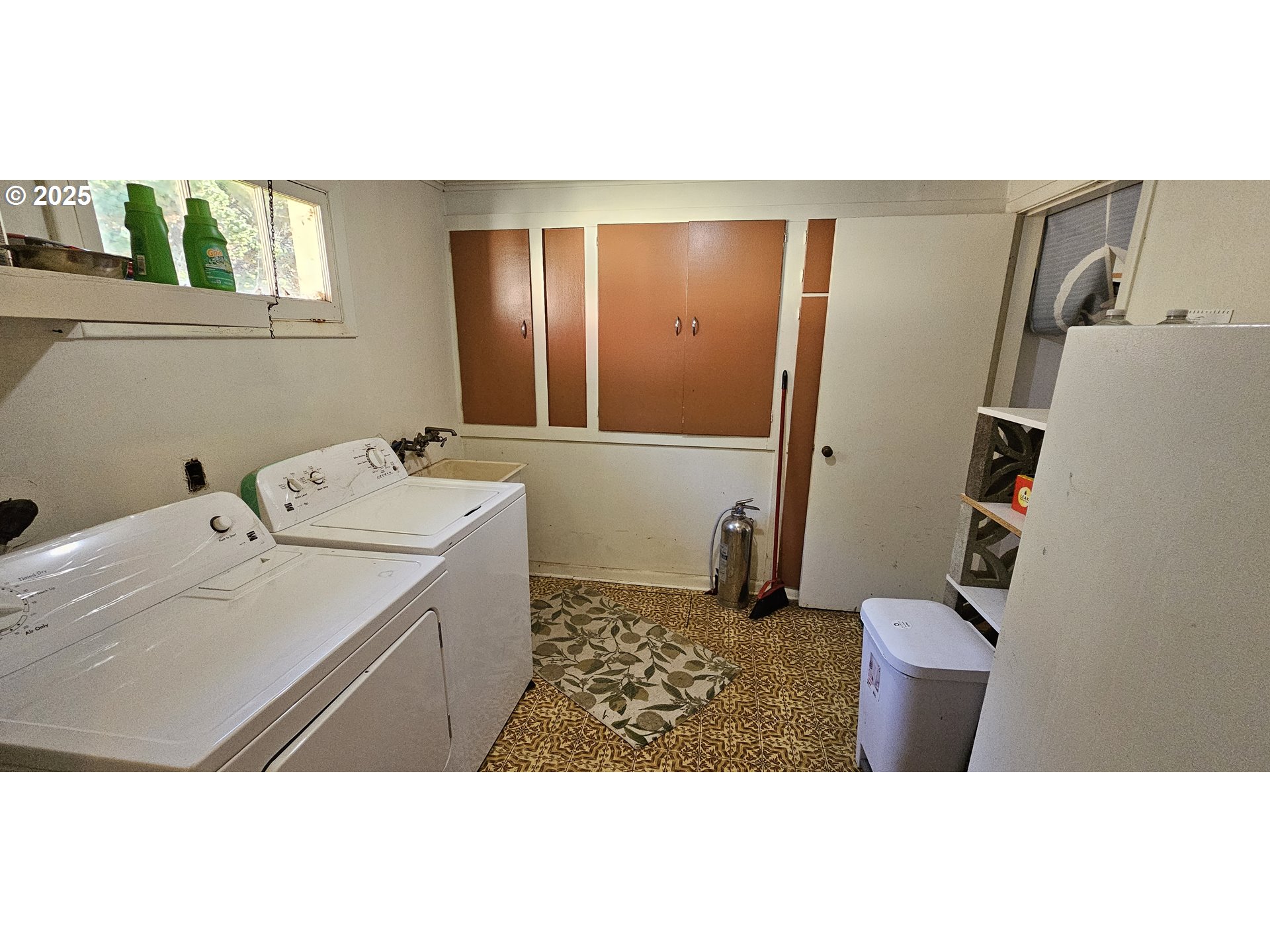 33261 Ophir Road Gold Beach, OR 97444 - Photo 16 of 36 a bathroom with a sink a toilet and a mirror
