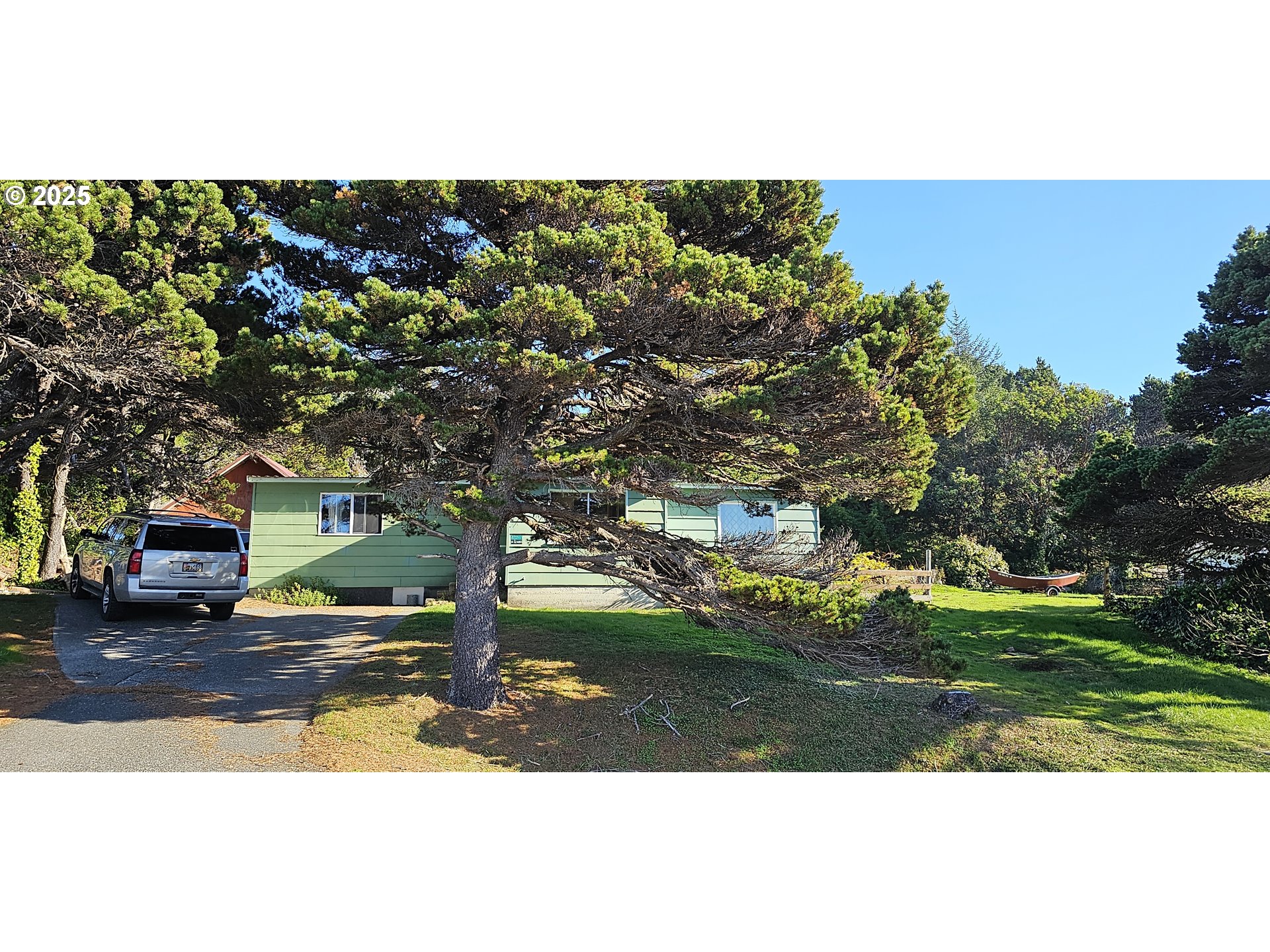 33261 Ophir Road Gold Beach, OR 97444 - Photo 2 of 36 a view of a park with large trees