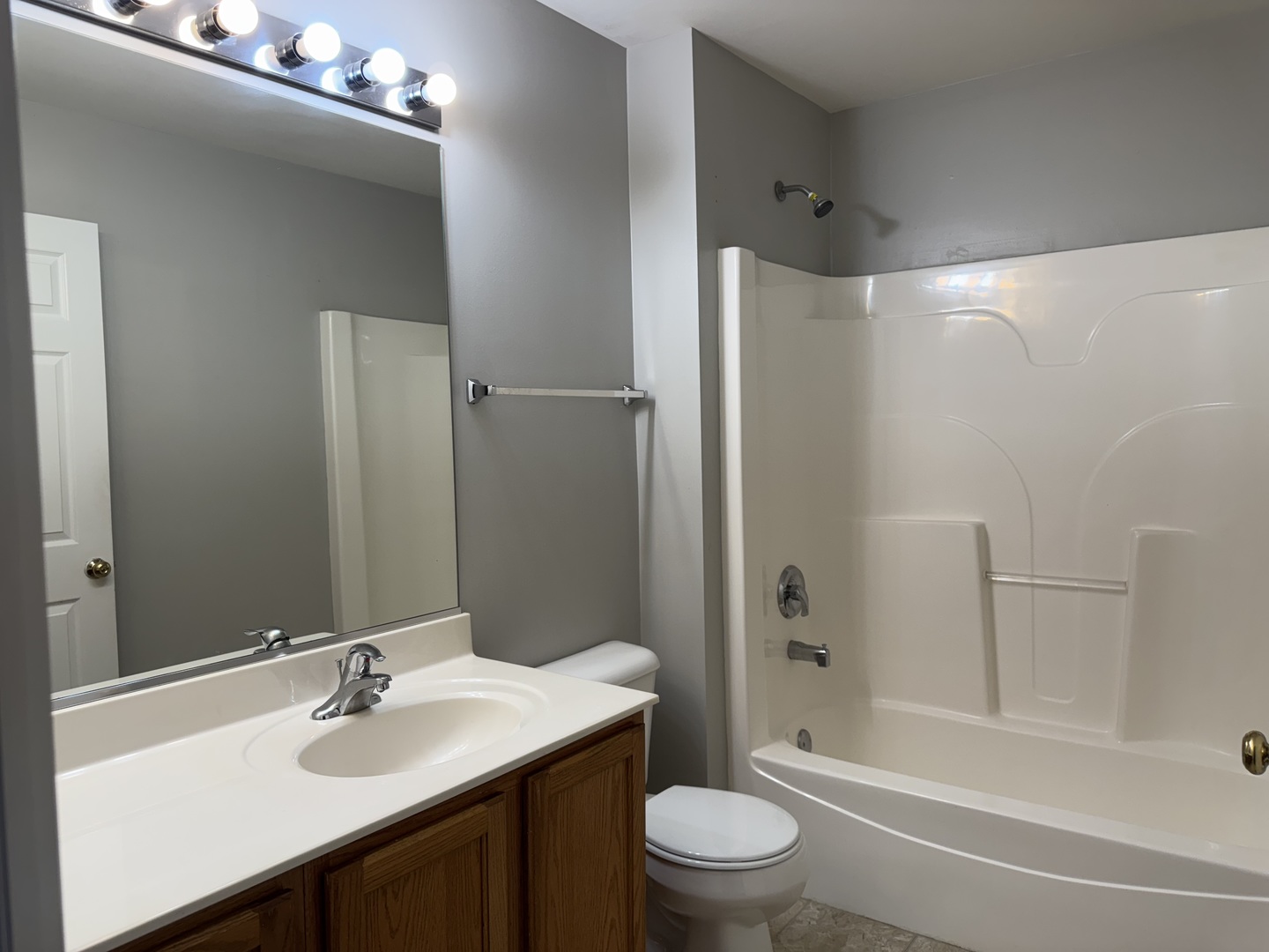 537 North Red Deer Road Round Lake, IL 60073 - Photo 12 of 12 a bathroom with a sink toilet and shower