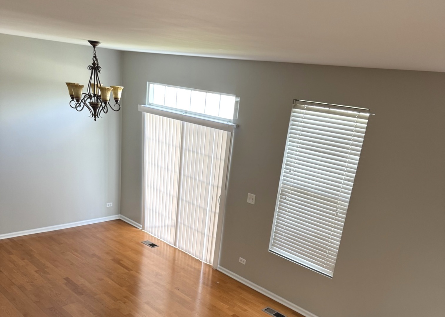 537 North Red Deer Road Round Lake, IL 60073 - Photo 5 of 12 wooden floor in an empty room with a window