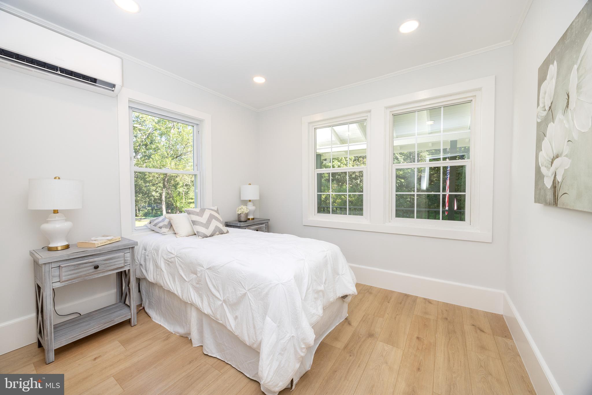107 Rock Ridge Road Ottsville, PA 18942 - Photo 13 of 24 a bedroom with a bed and a window
