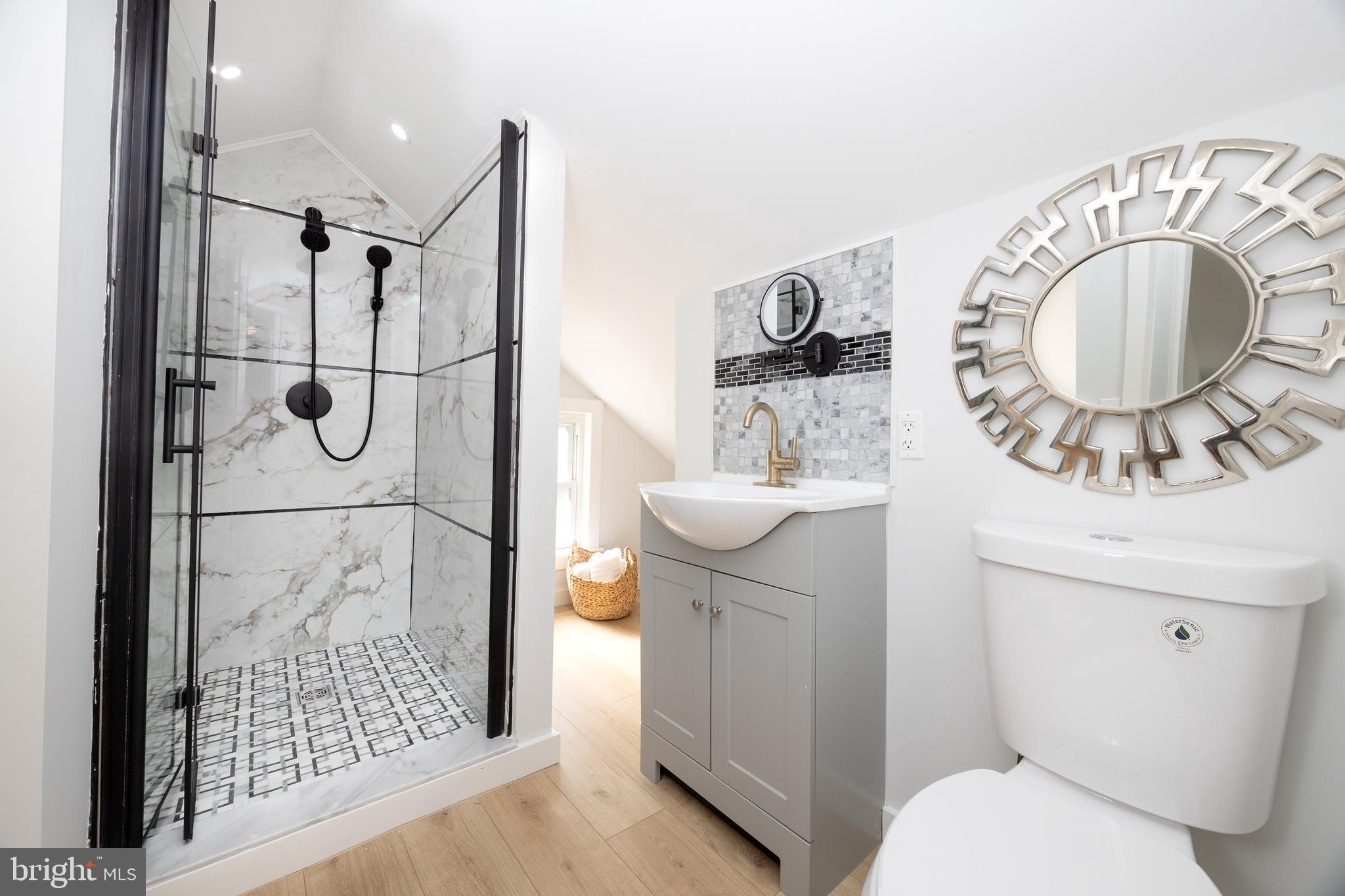 107 Rock Ridge Road Ottsville, PA 18942 - Photo 18 of 24 a bathroom with a sink a toilet and shower