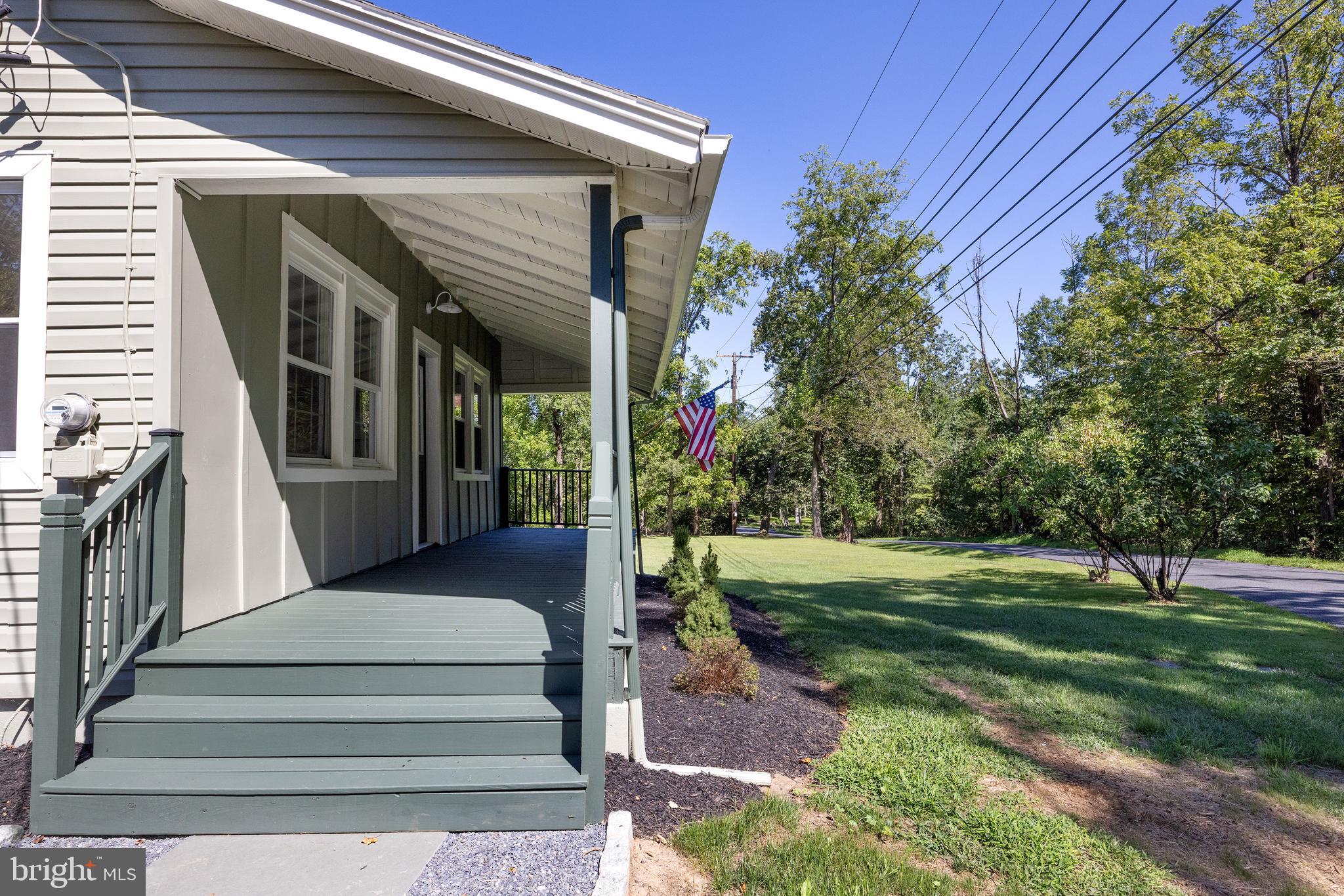 107 Rock Ridge Road Ottsville, PA 18942 - Photo 2 of 24 a view of a house with a yard