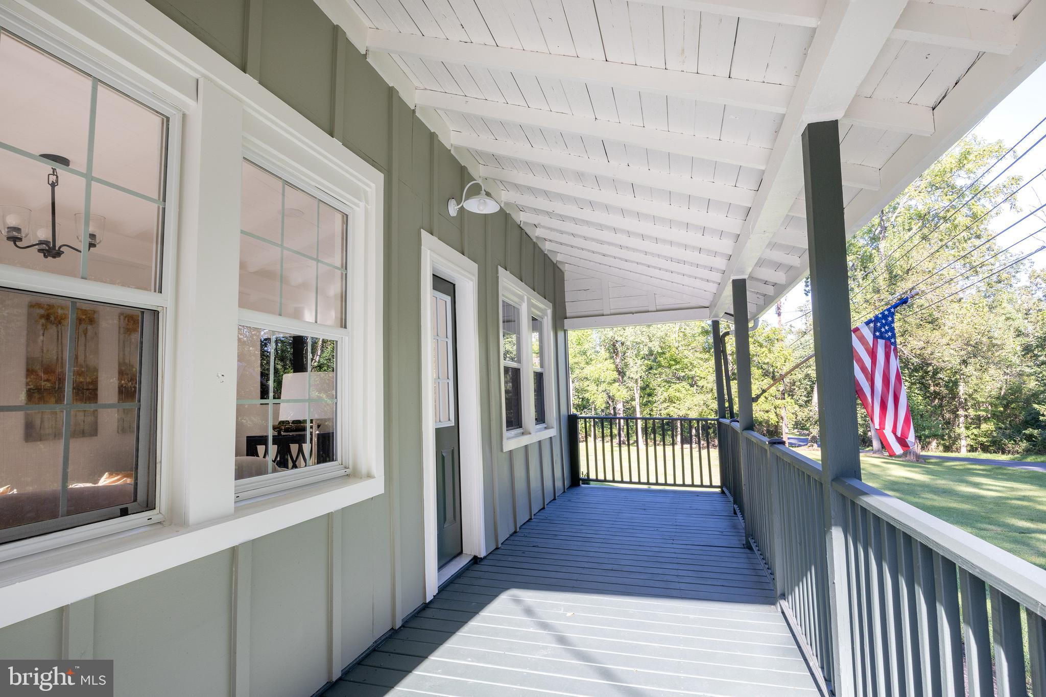107 Rock Ridge Road Ottsville, PA 18942 - Photo 3 of 24 a front view of a house with a porch