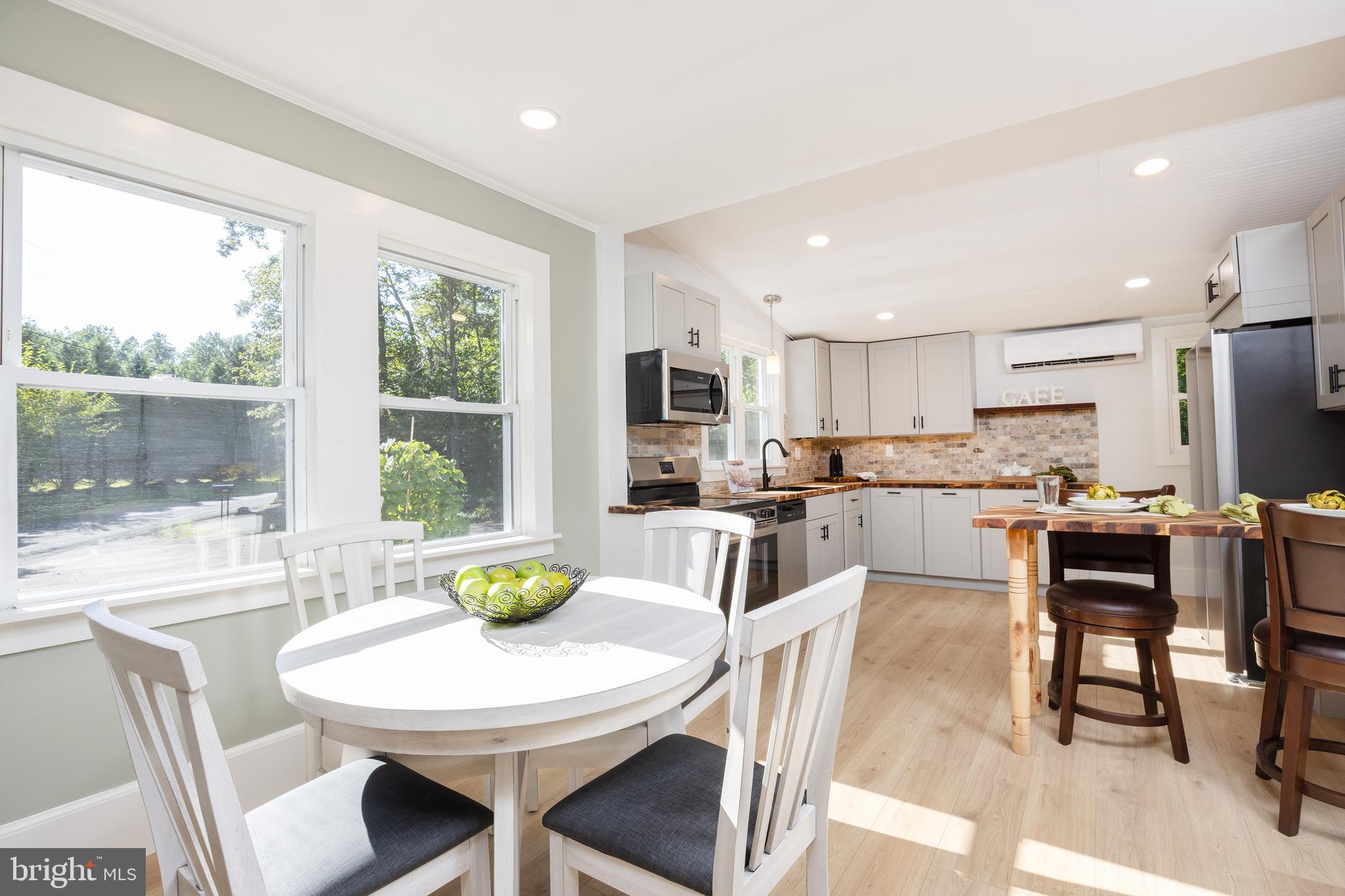107 Rock Ridge Road Ottsville, PA 18942 - Photo 9 of 24 a view of a dining room with furniture window and outside view