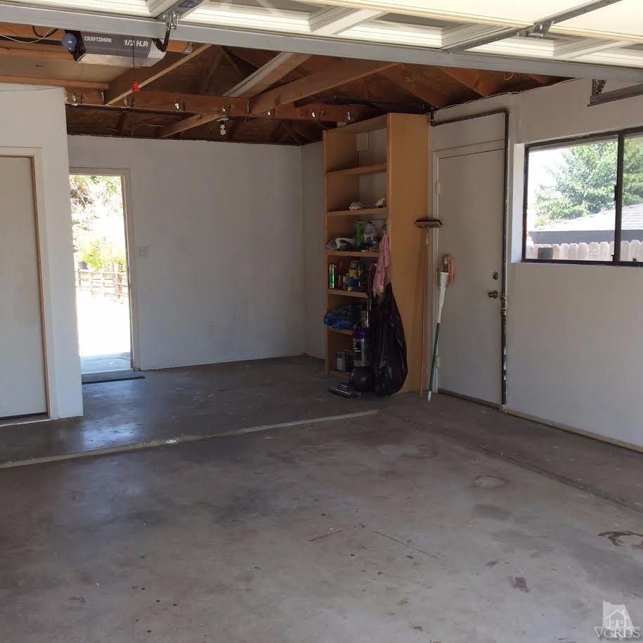22813 Clover Spring Place Tehachapi, CA 93561 - Photo 19 of 20 a view of a room with wooden walls and a window