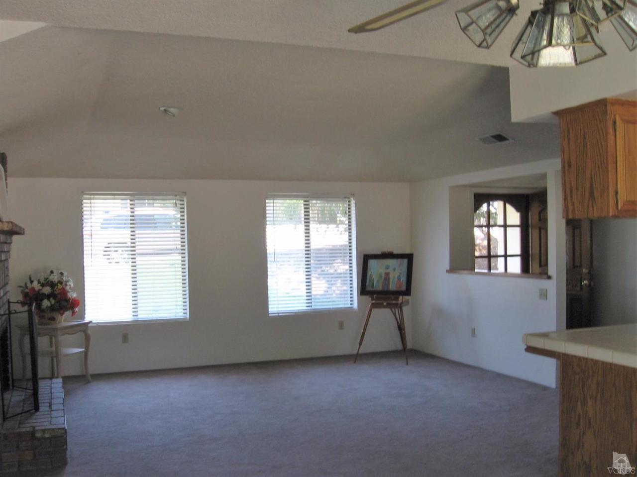 22813 Clover Spring Place Tehachapi, CA 93561 - Photo 5 of 20 a view of an empty room with a window