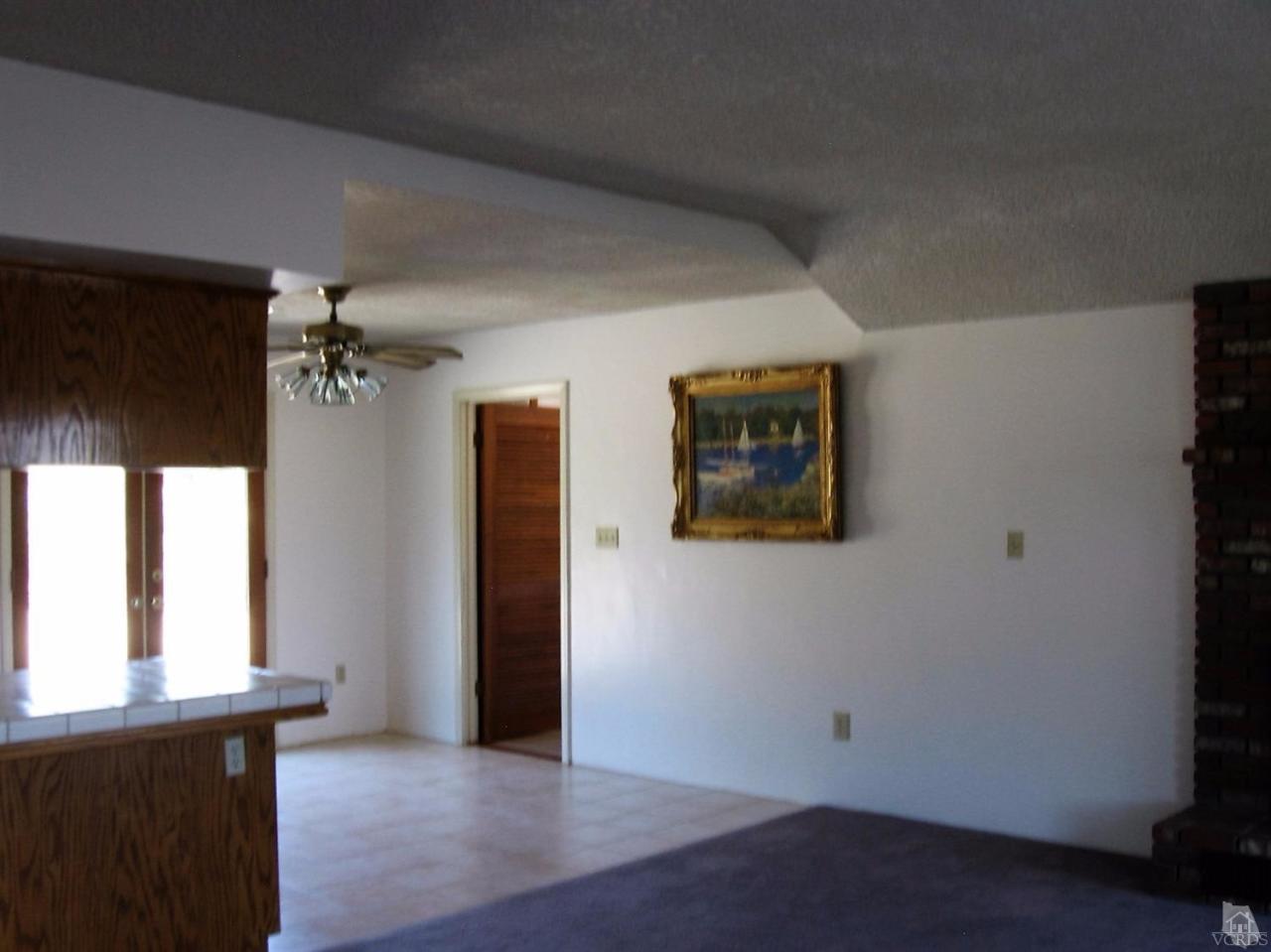 22813 Clover Spring Place Tehachapi, CA 93561 - Photo 6 of 20 an empty room with windows and closet
