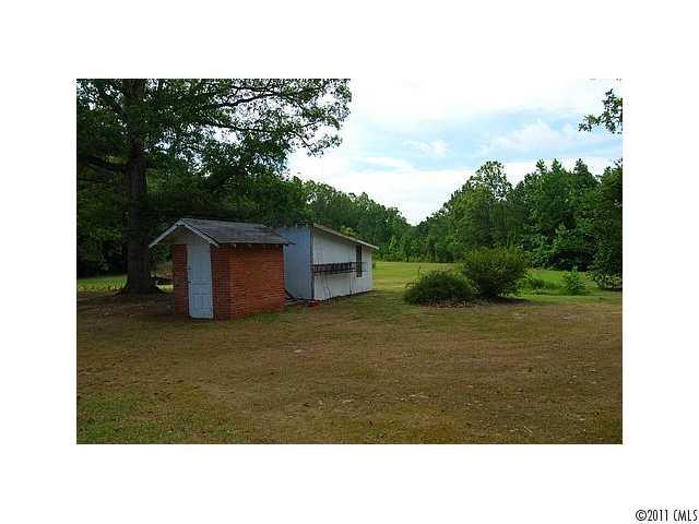 2318 Shiloh Unity Road Lancaster, SC 29720 - Photo 2 of 12 a black and white photo of a house