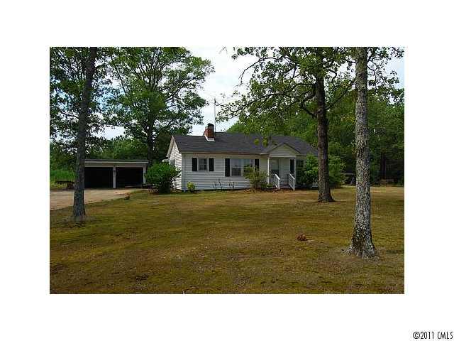 2318 Shiloh Unity Road Lancaster, SC 29720 - Photo 5 of 12 a house view with a garden space