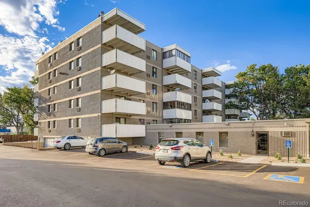 a car parked in front of a building