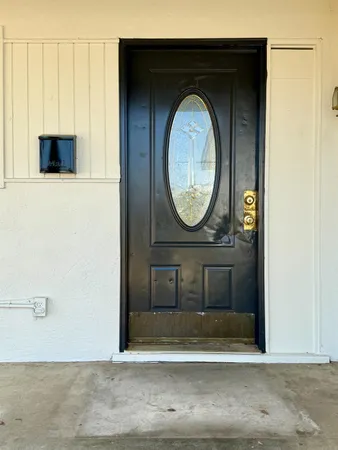 a front view of a house with wooden floor