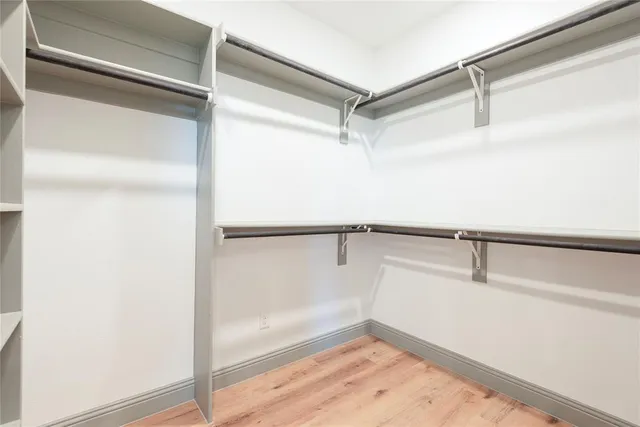 a view of a kitchen with a dishwasher and a refrigerator