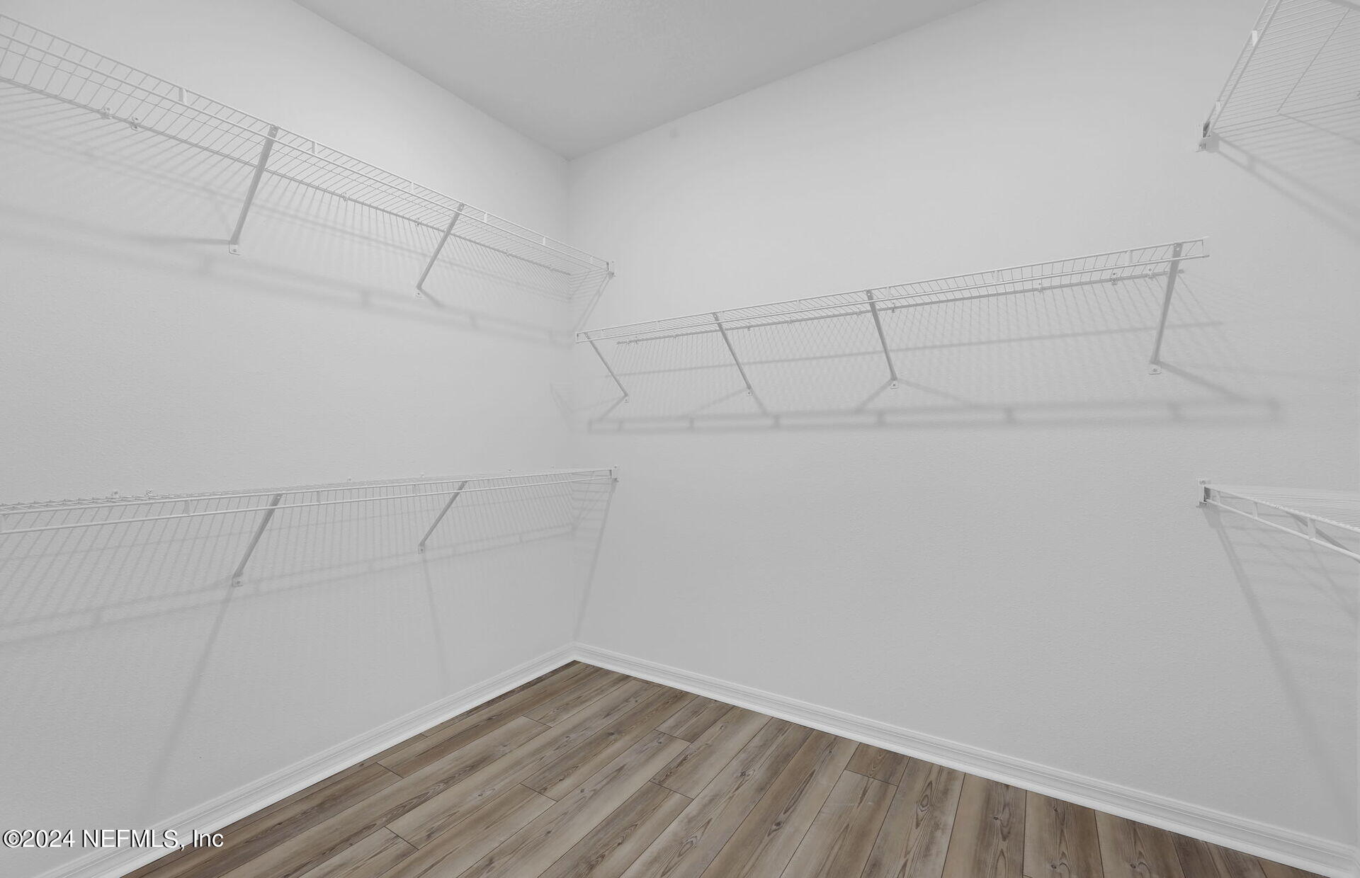 236 Hickory Pine Drive St. Augustine, FL 32092 - Photo 24 of 46 Palmary Owner's Walk-In Closet