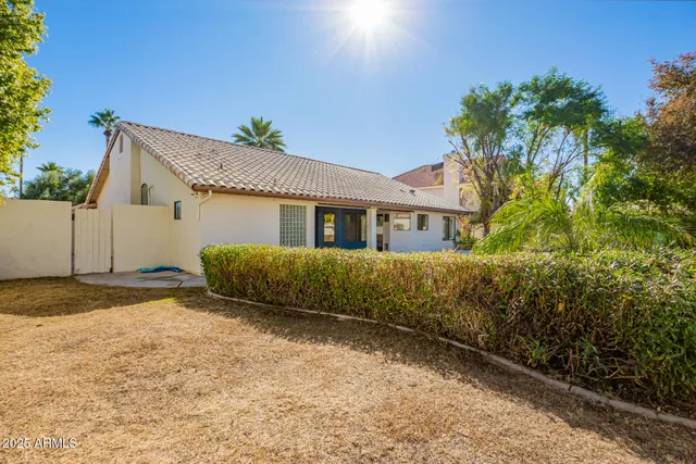 a view of backyard of house