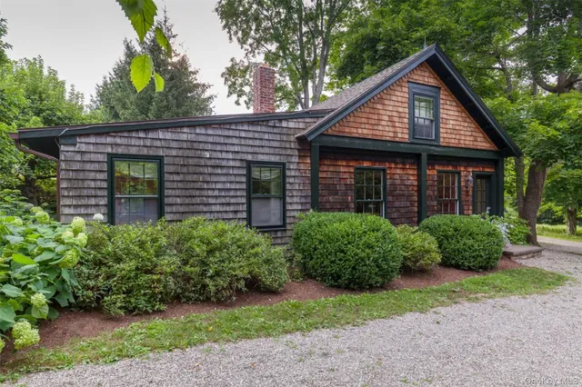 a view of a kitchen with a sink and cabinets