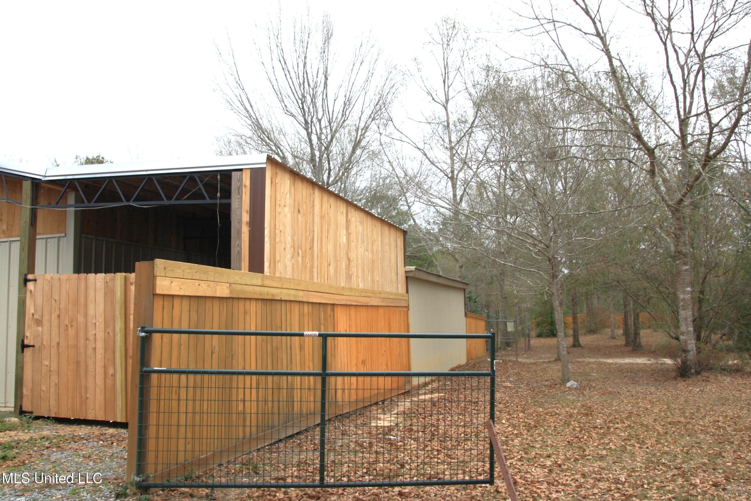 18144 Shaw Road Saucier, MS 39574 - Photo 14 of 15 Side Fencing