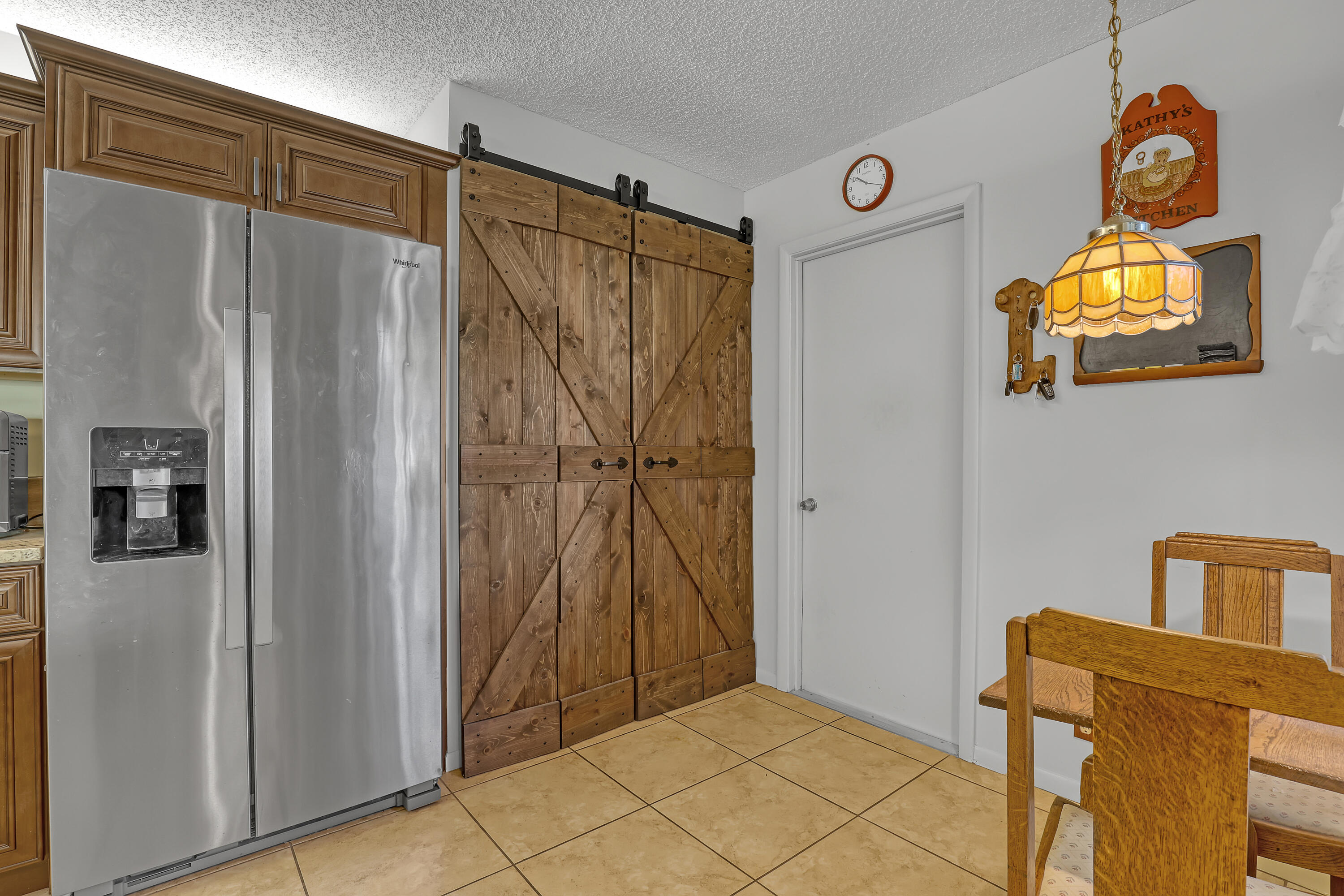 13116 Quiet Woods Road, Unit A Wellington, FL 33414 - Photo 13 of 31 a bathroom with a window and a shower