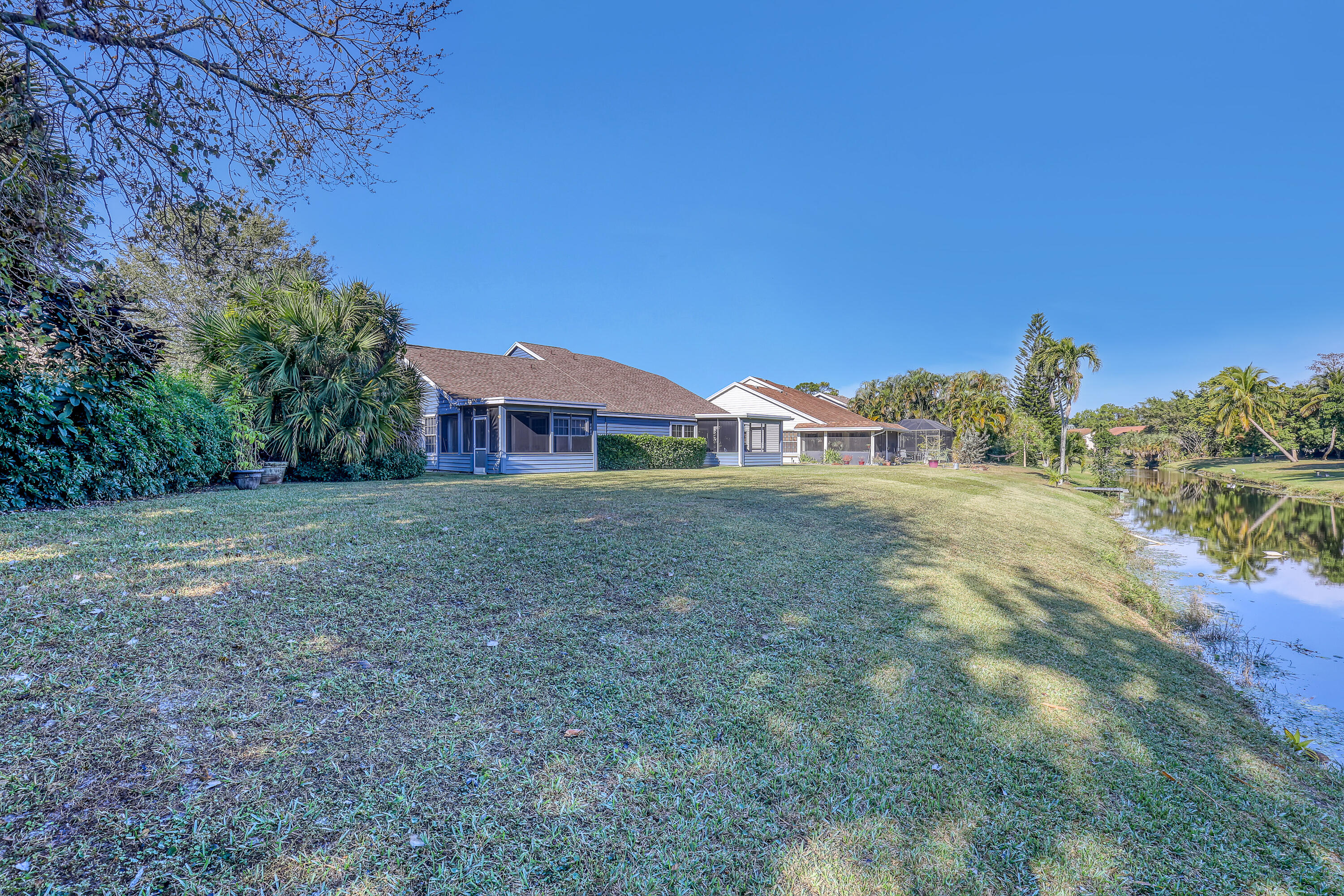 13116 Quiet Woods Road, Unit A Wellington, FL 33414 - Photo 31 of 31 a view of house with outdoor space