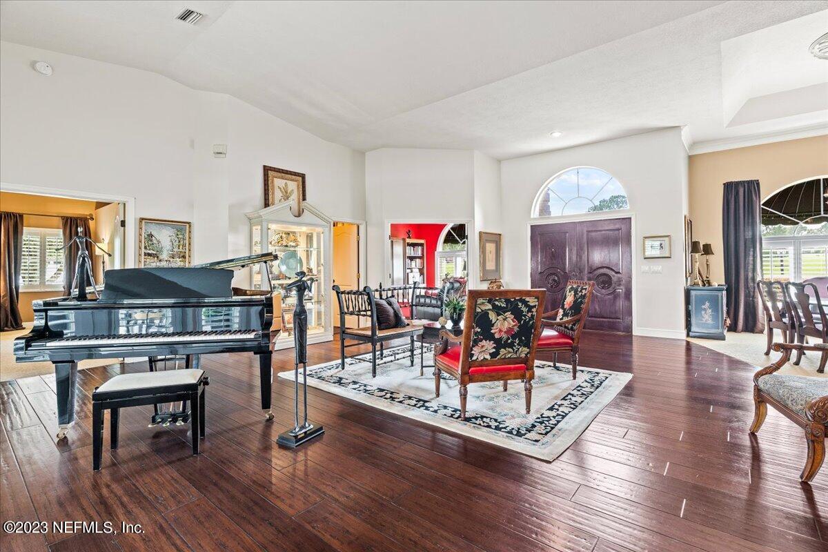 1289 North Cherry Pop Drive Hernando, FL 34442 - Photo 14 of 99 a view of a livingroom with furniture and a potted plant