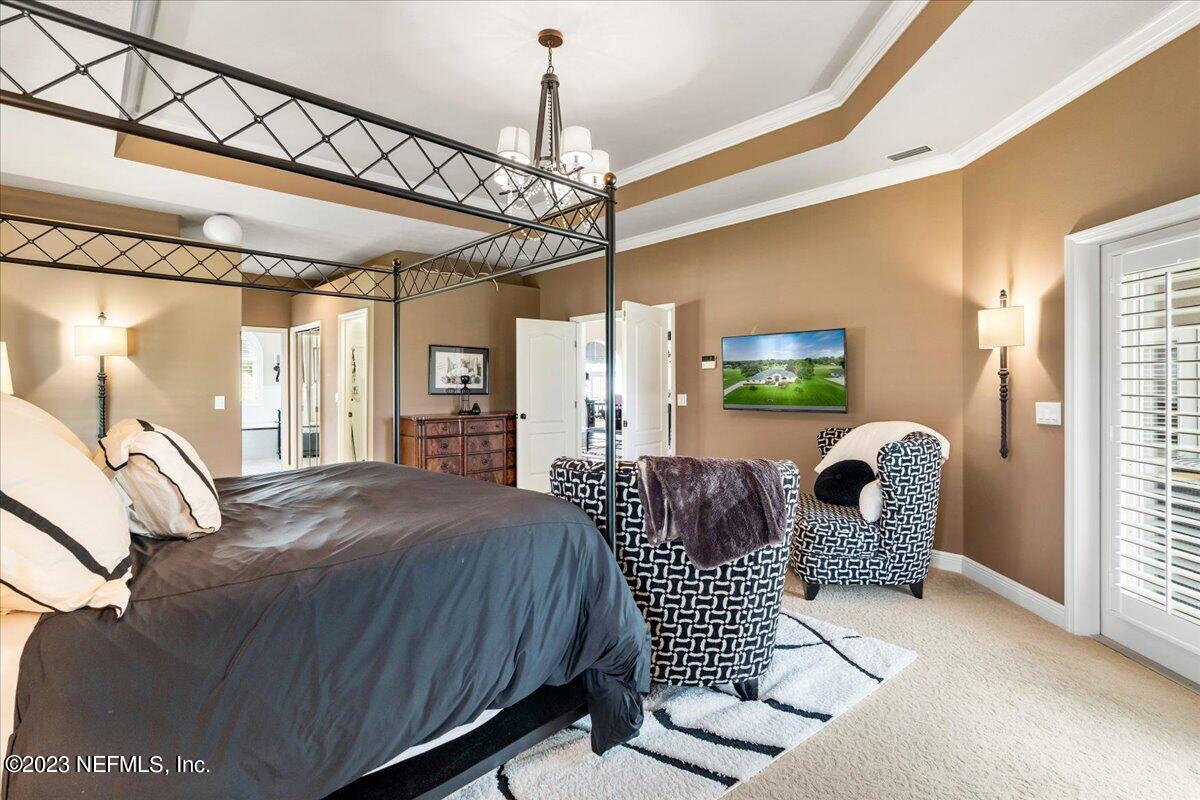 1289 North Cherry Pop Drive Hernando, FL 34442 - Photo 38 of 99 a bedroom with furniture and a window