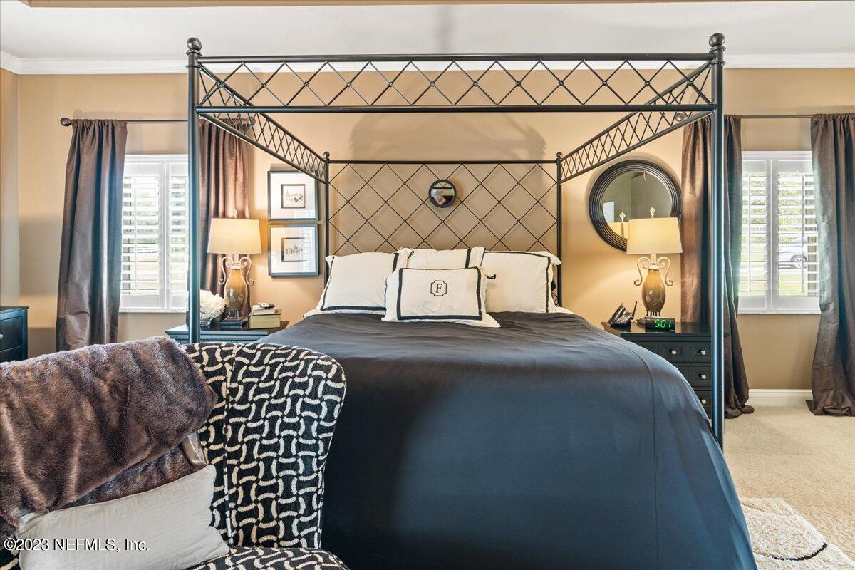 1289 North Cherry Pop Drive Hernando, FL 34442 - Photo 39 of 99 a bedroom with a bed and a window