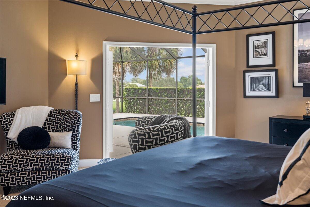 1289 North Cherry Pop Drive Hernando, FL 34442 - Photo 42 of 99 a bedroom with a bed and wooden floor