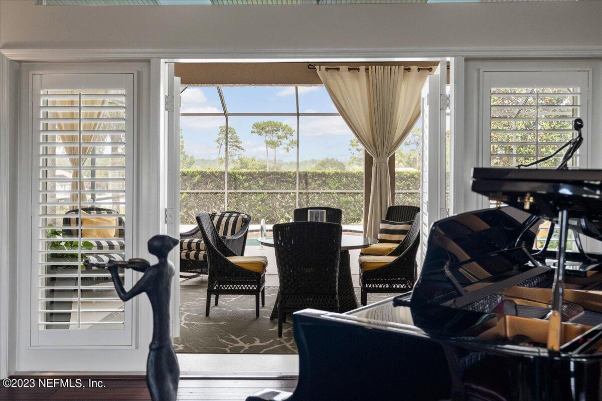 1289 North Cherry Pop Drive Hernando, FL 34442 - Photo 59 of 99 a view of a dining room with furniture window and outside view