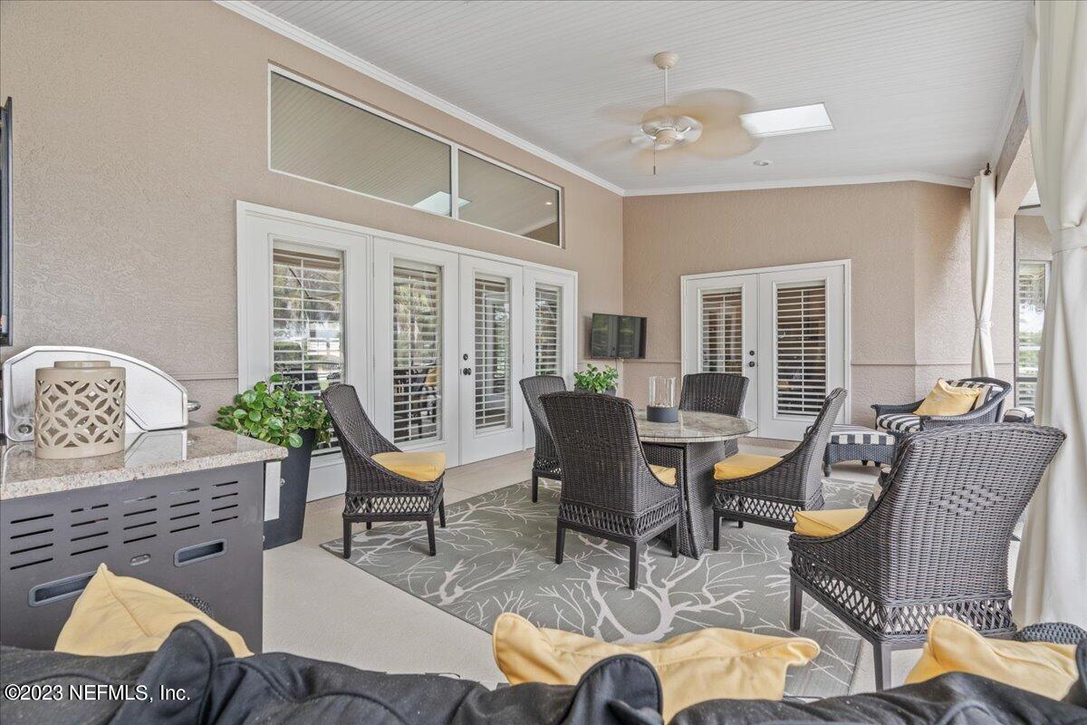 1289 North Cherry Pop Drive Hernando, FL 34442 - Photo 61 of 99 a view of a dining room with furniture window and outside view