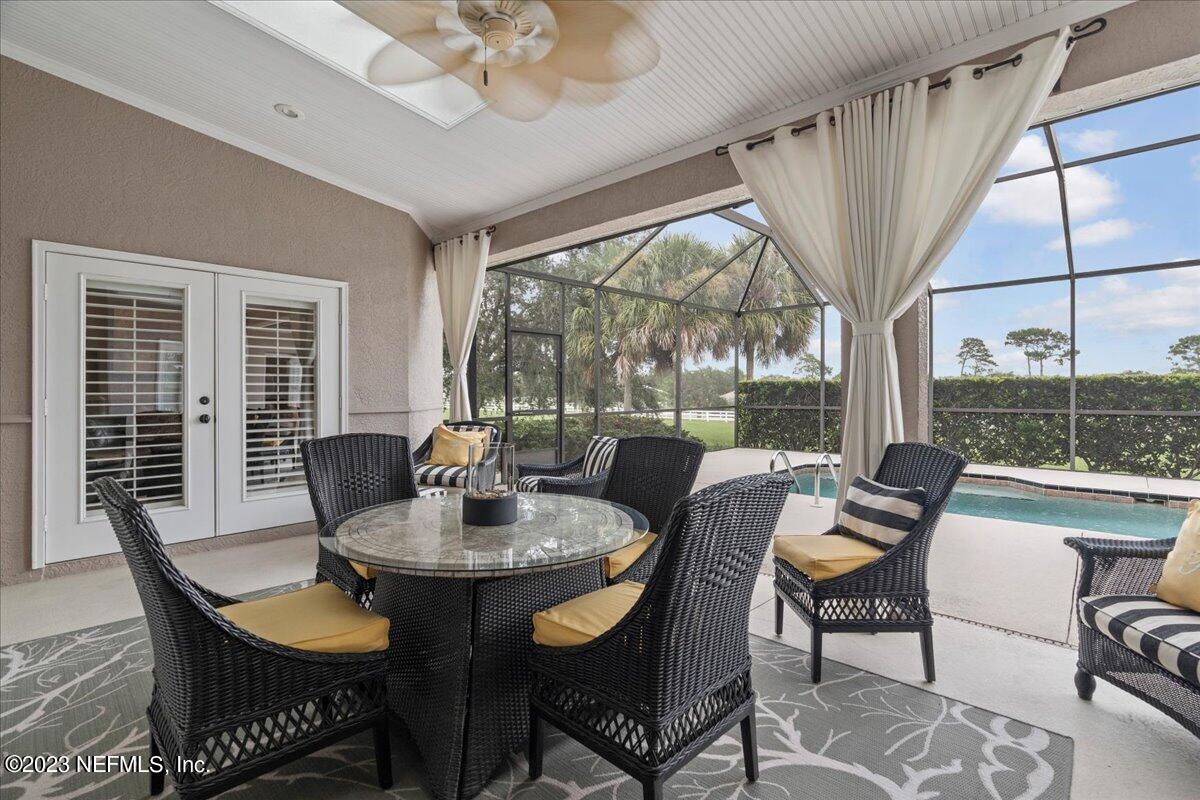 1289 North Cherry Pop Drive Hernando, FL 34442 - Photo 64 of 99 a view of a dining room with furniture window and outside view