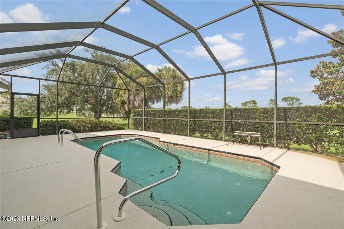 1289 North Cherry Pop Drive Hernando, FL 34442 - Photo 69 of 99 a view of a house with a swimming pool