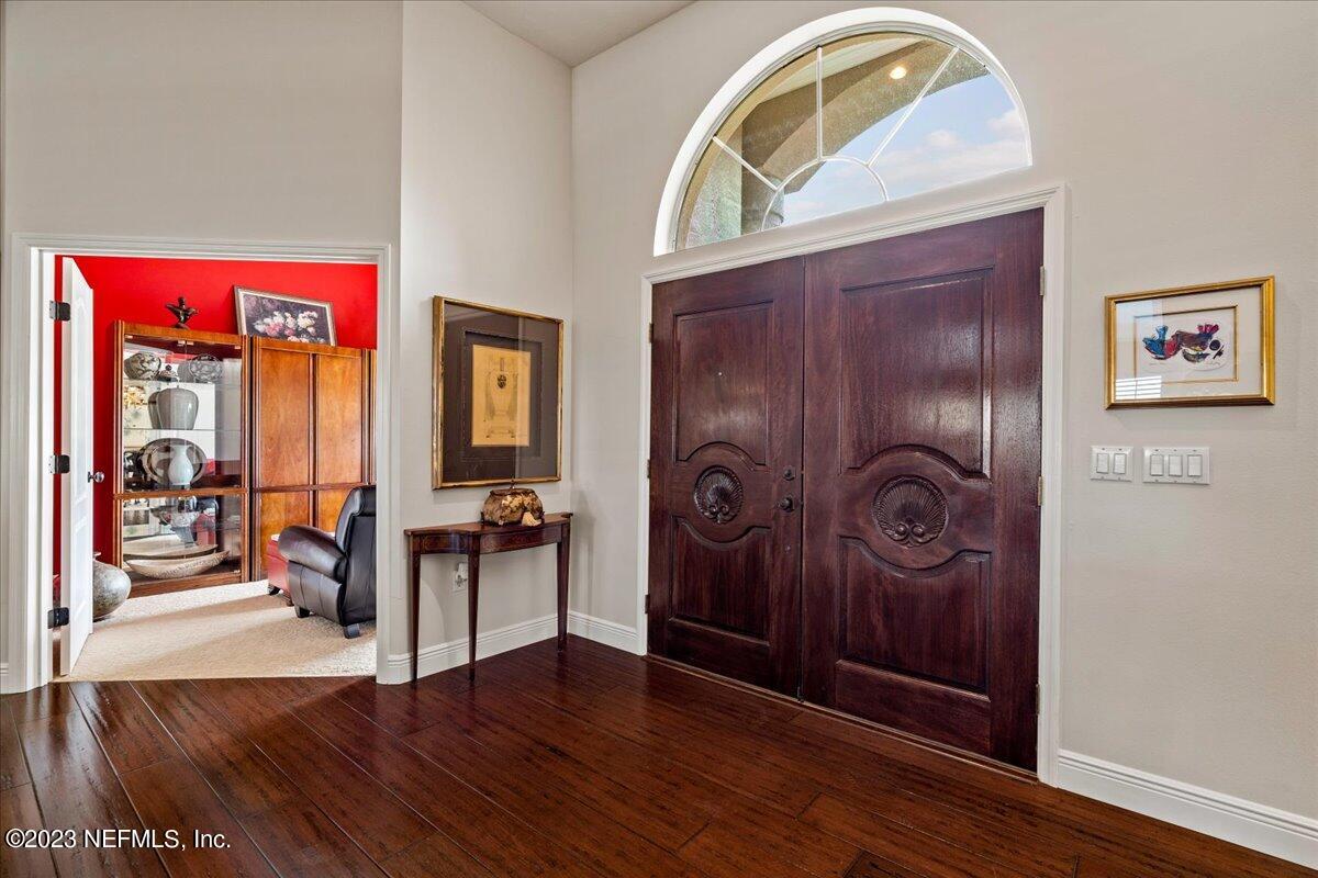 1289 North Cherry Pop Drive Hernando, FL 34442 - Photo 8 of 99 a view of an entryway door with wooden floor