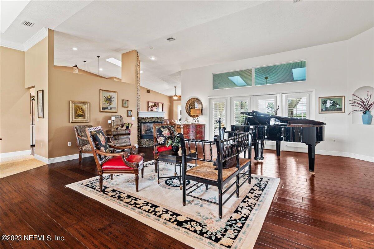 1289 North Cherry Pop Drive Hernando, FL 34442 - Photo 10 of 99 a living room with furniture and wooden floor