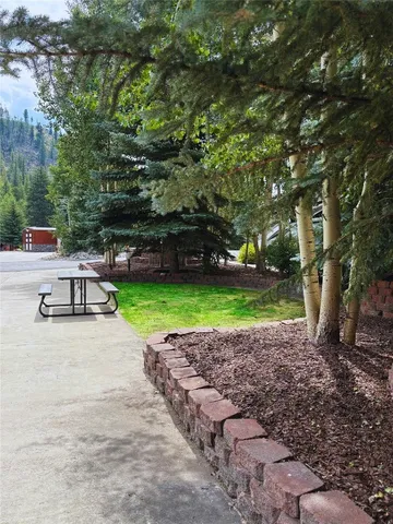 a view of a backyard with a garden