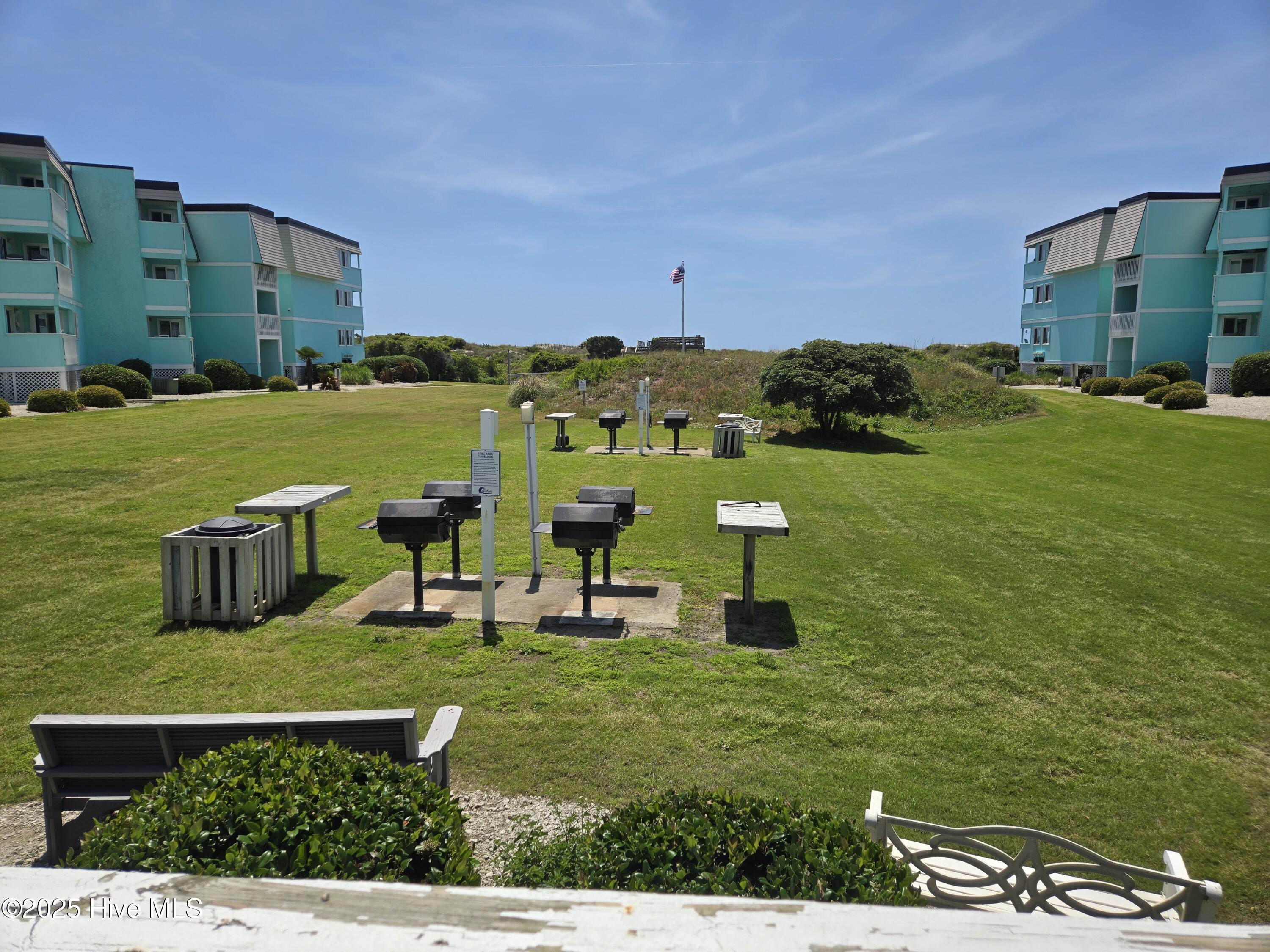 301 Commerce Way, Unit 104 Atlantic Beach, NC 28512 - Photo 35 of 47 Courtyard and grilling area