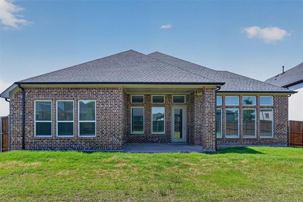 845 Ranchland Road Justin, TX 76247 - Photo 21 of 22 front view of a house with a yard