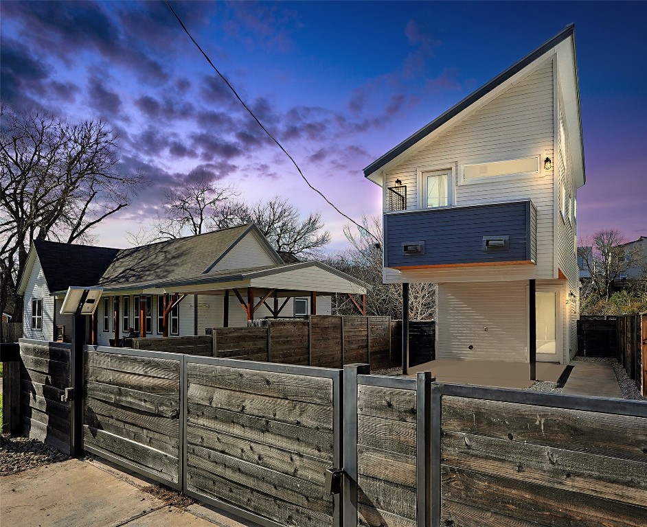 a front view of a house with parking