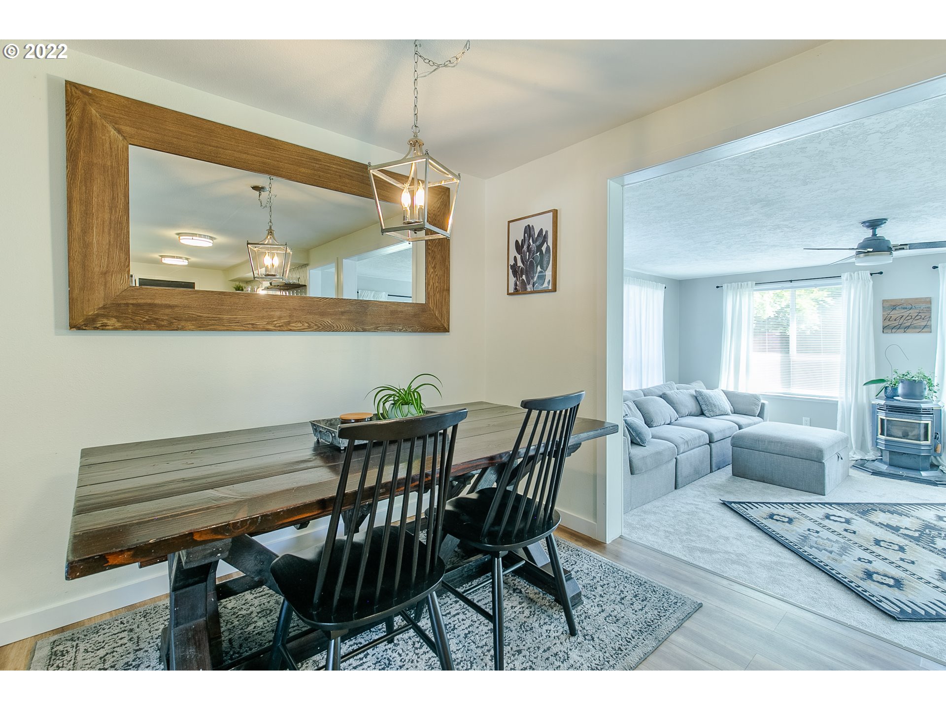 2529 27th Street Springfield, OR 97477 - Photo 5 of 20 a view of a dining room with furniture wooden floor and chandelier