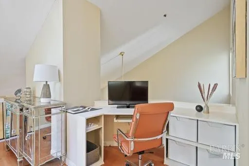 a view of a workspace with furniture