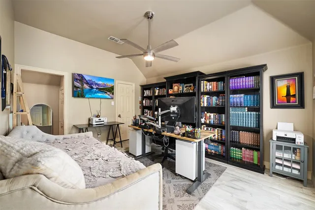 a kitchen with stainless steel appliances kitchen island granite countertop a stove and cabinets