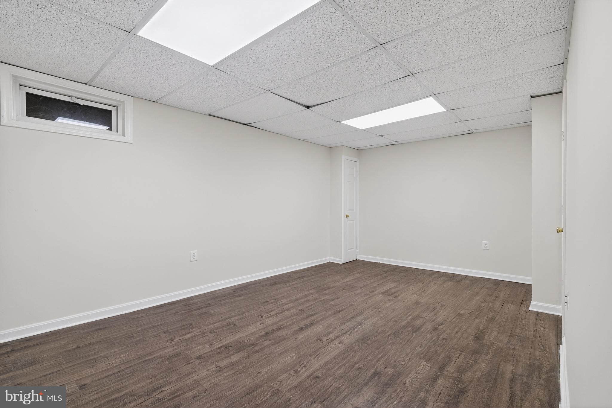 6476 Franconia Court Springfield, VA 22150 - Photo 33 of 41 a view of an empty room with wooden floor