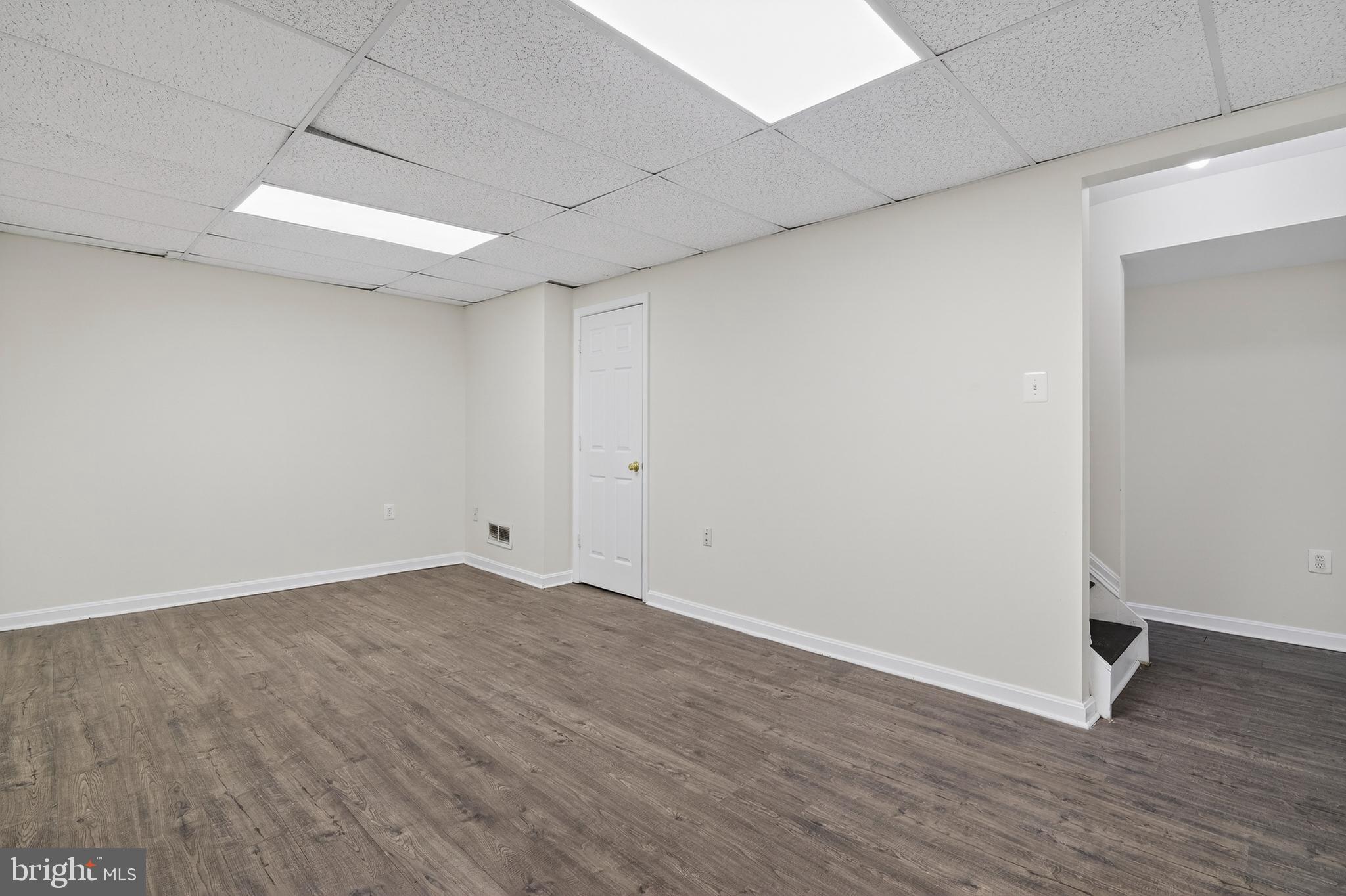 6476 Franconia Court Springfield, VA 22150 - Photo 34 of 41 a view of an empty room with wooden floor