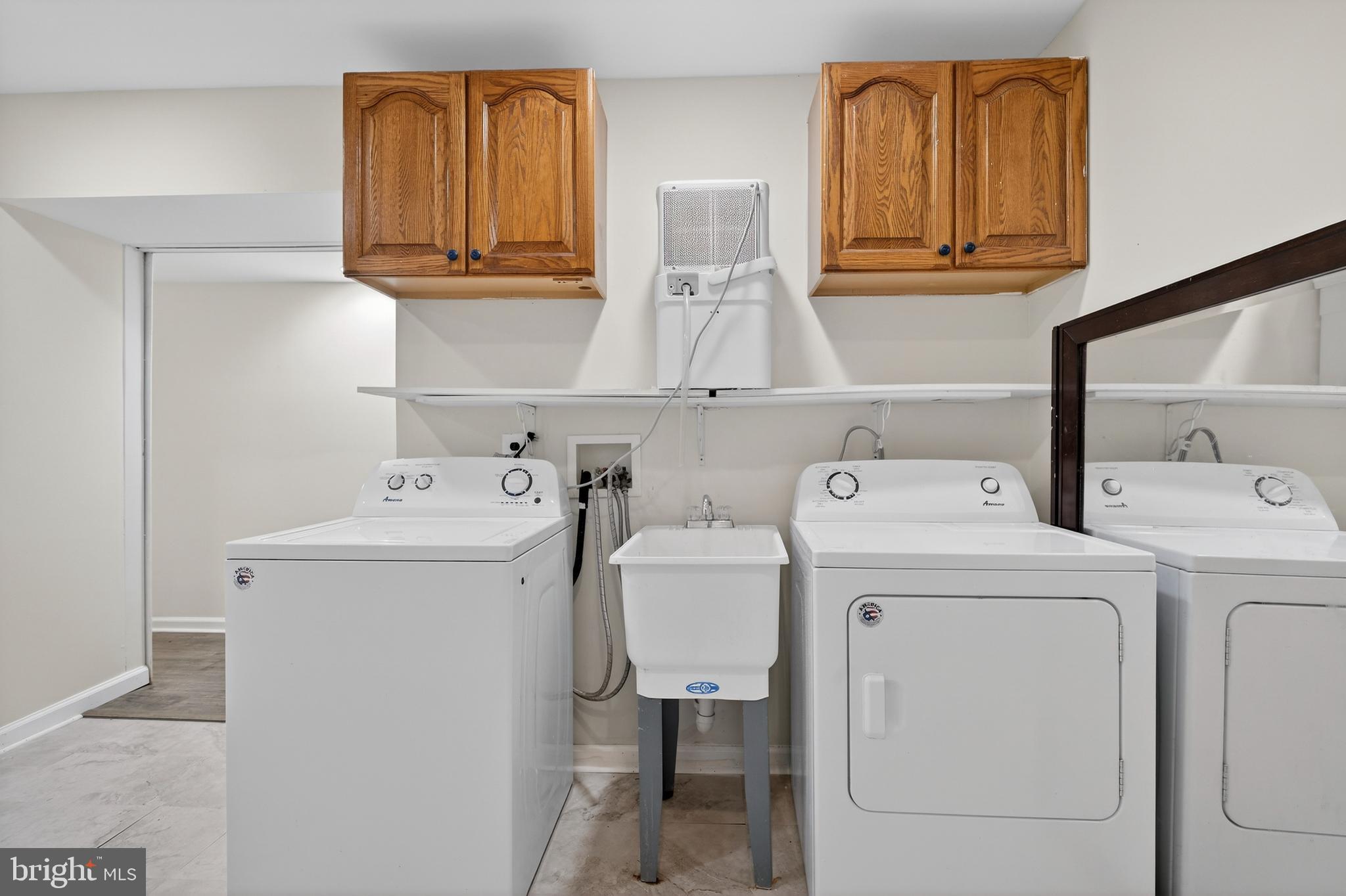 6476 Franconia Court Springfield, VA 22150 - Photo 36 of 41 a utility room with dryer and washer